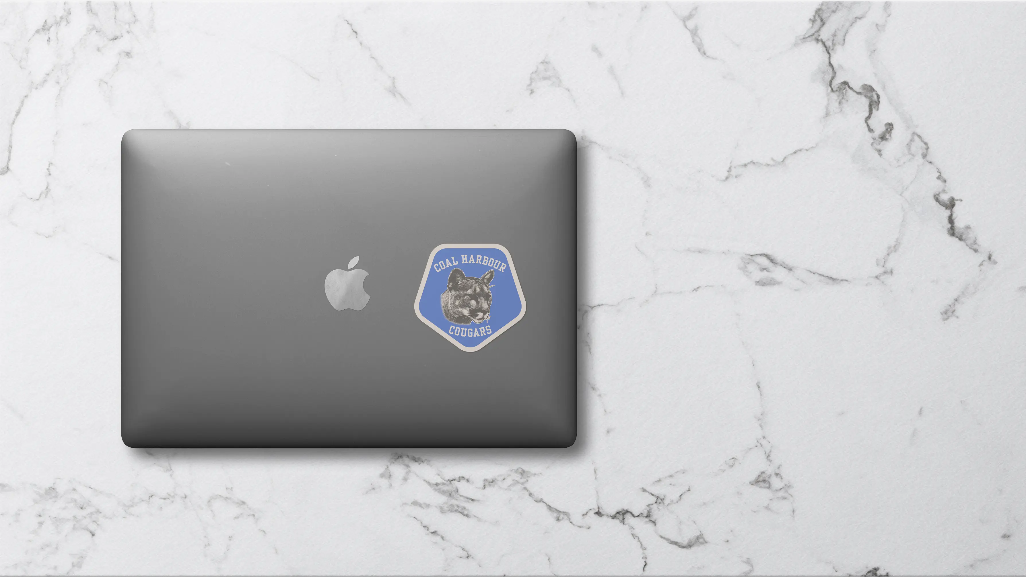Sticker On Macbook Mockup Image