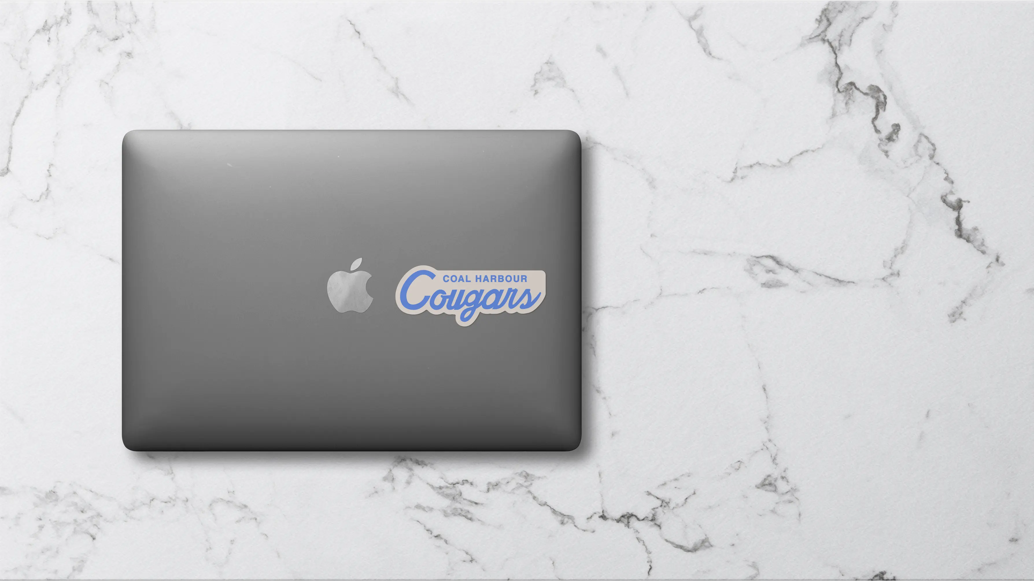 Sticker On Macbook Mockup Image