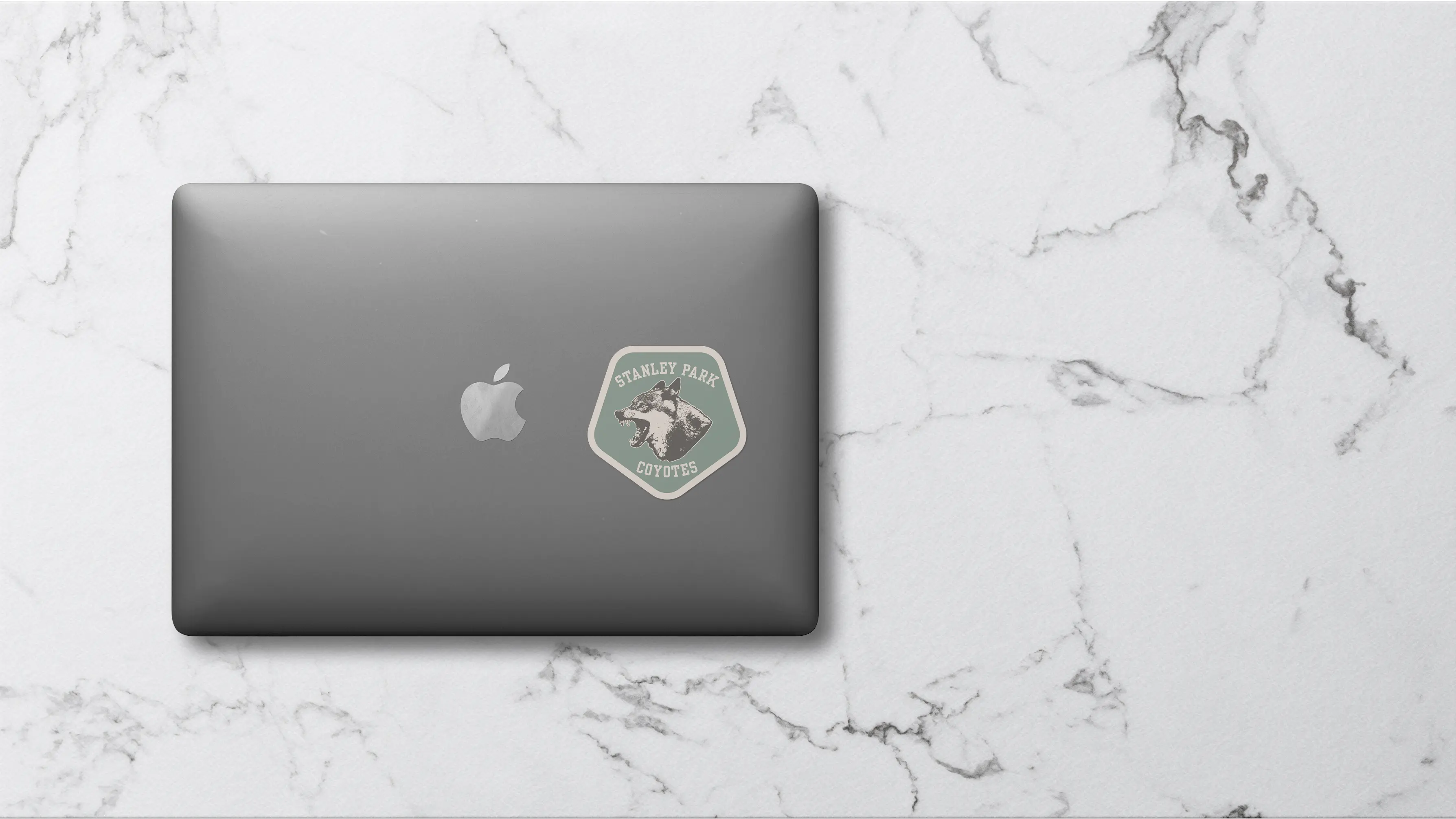 Sticker On Macbook Mockup Image
